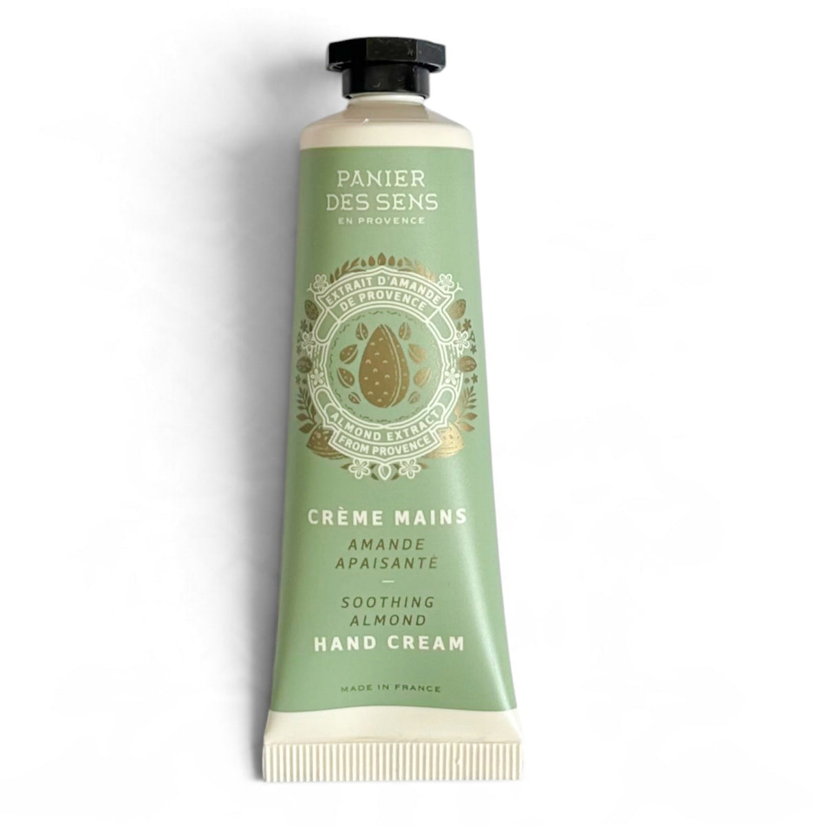Almond hand cream tube with beige body, green label, and black cap