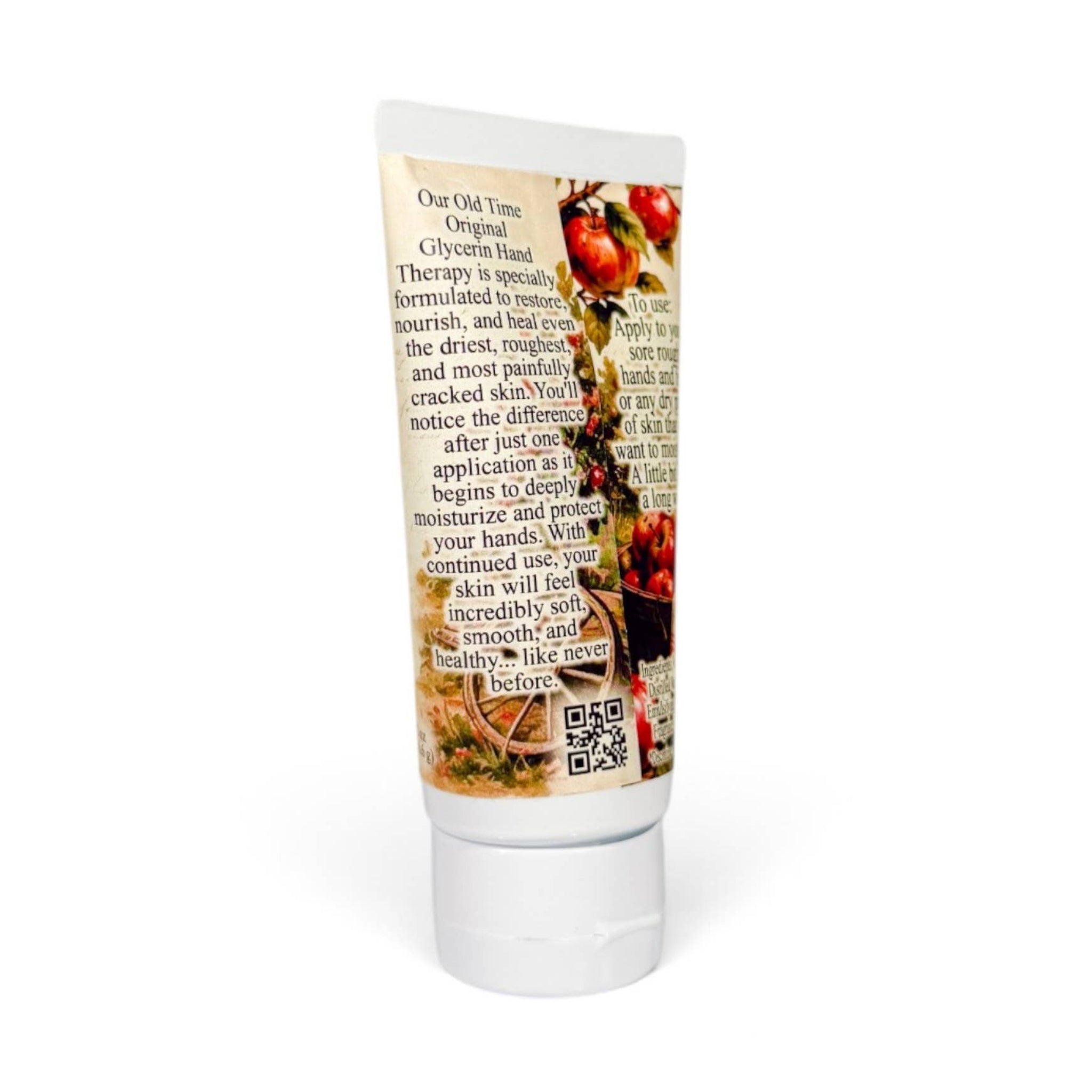 A squeeze tube of hand cream with a white cap, featuring a detailed label with text and images of tomatoes and hands, set against a plain white background.