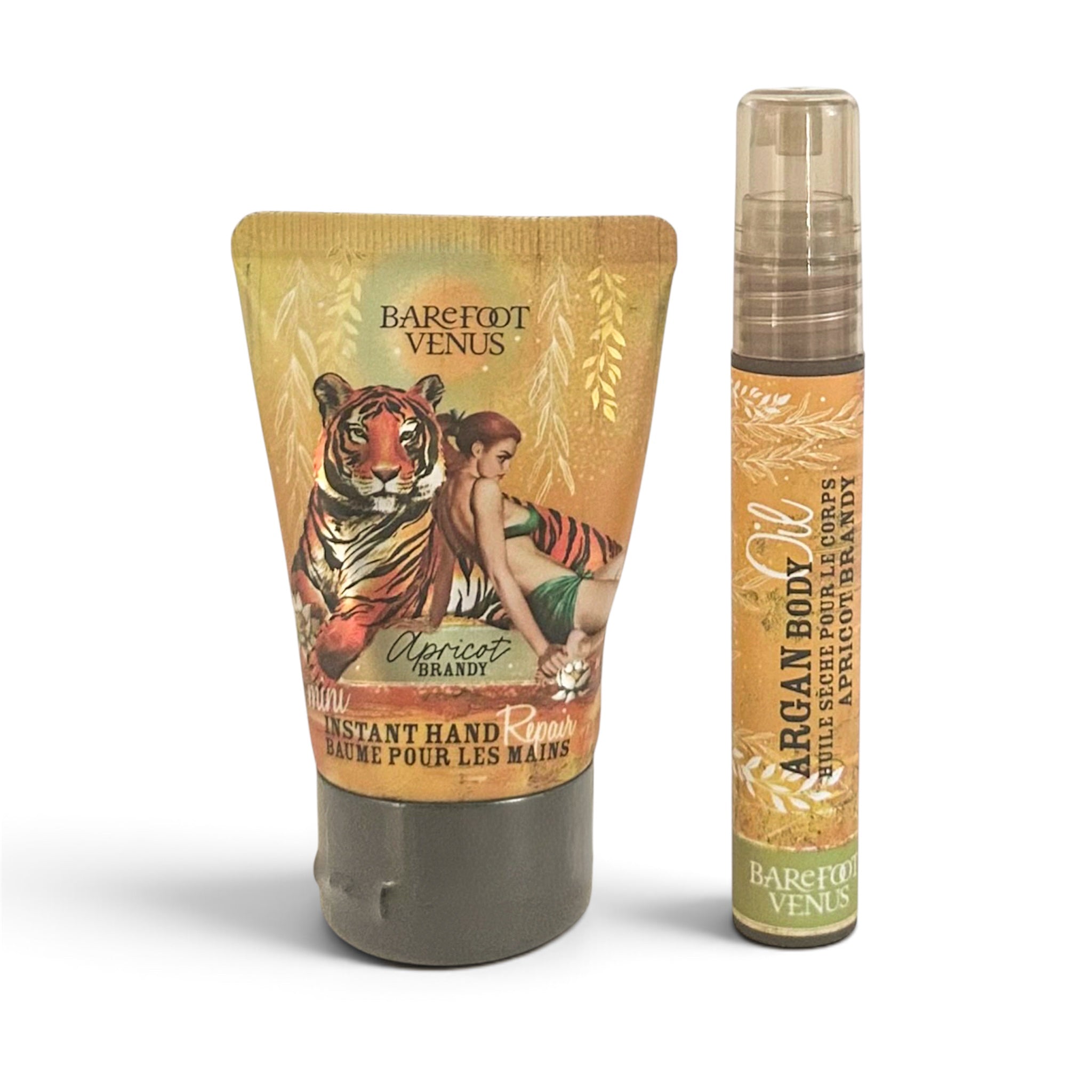 Barefoot Venus Argan Body Instant Hand and Body Lotion set, featuring a squeeze tube and a spray bottle with vintage tiger and woman illustration on a white background.