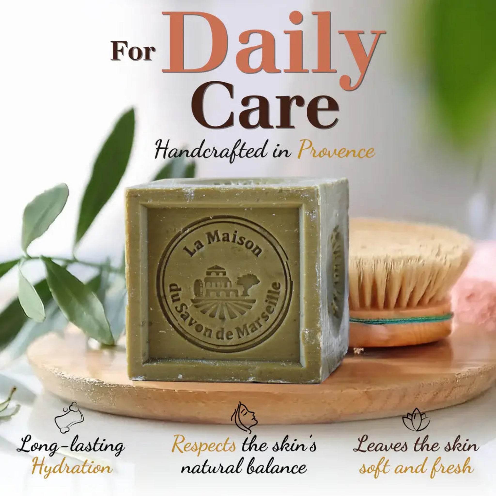 Marseille soap cube with round logo seal in a square, near a wooden brush