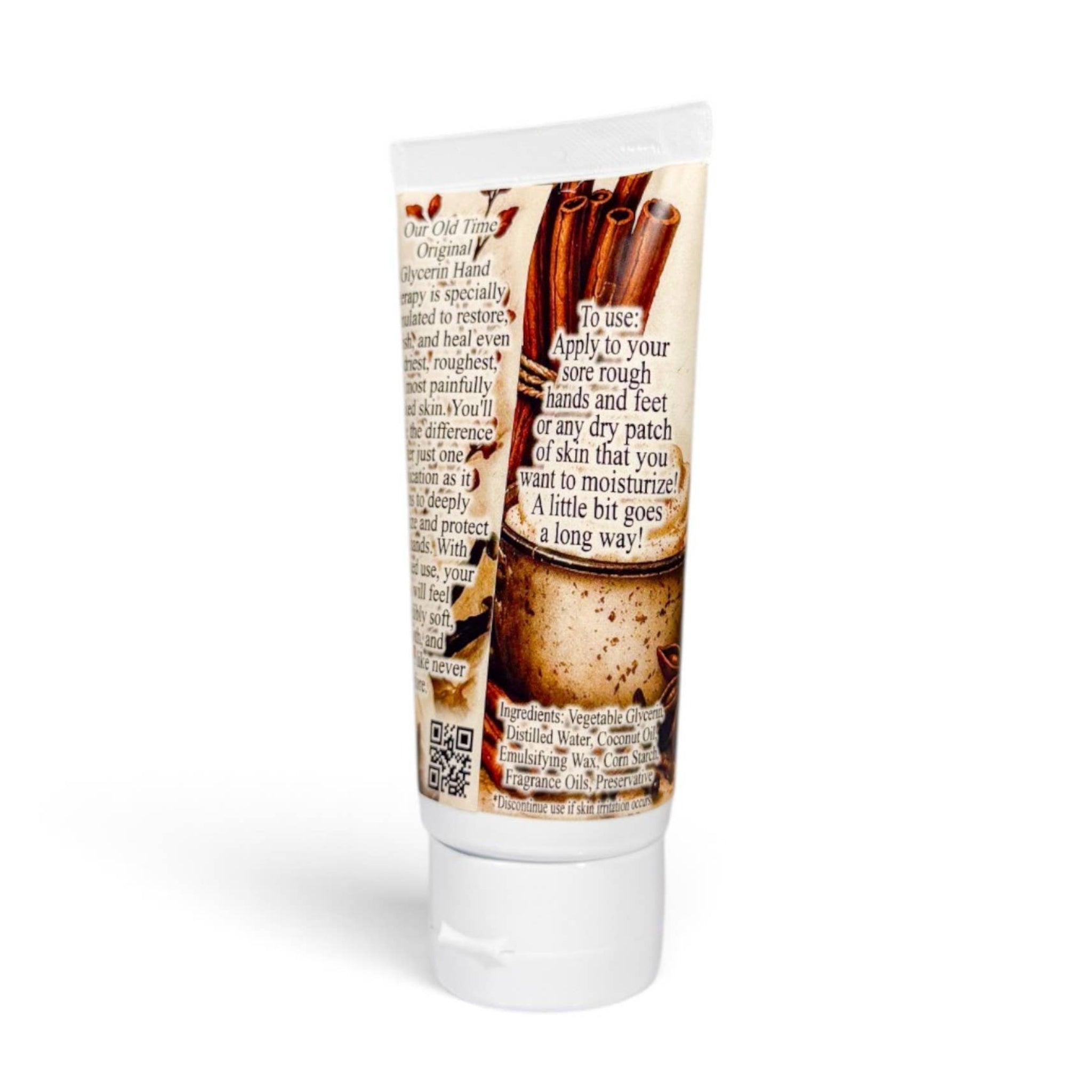 A squeeze tube of OLd Town Soap Co Moisturizing Hand Cream with a cinnamon stick and coffee bean design on the label, set against a plain white background.