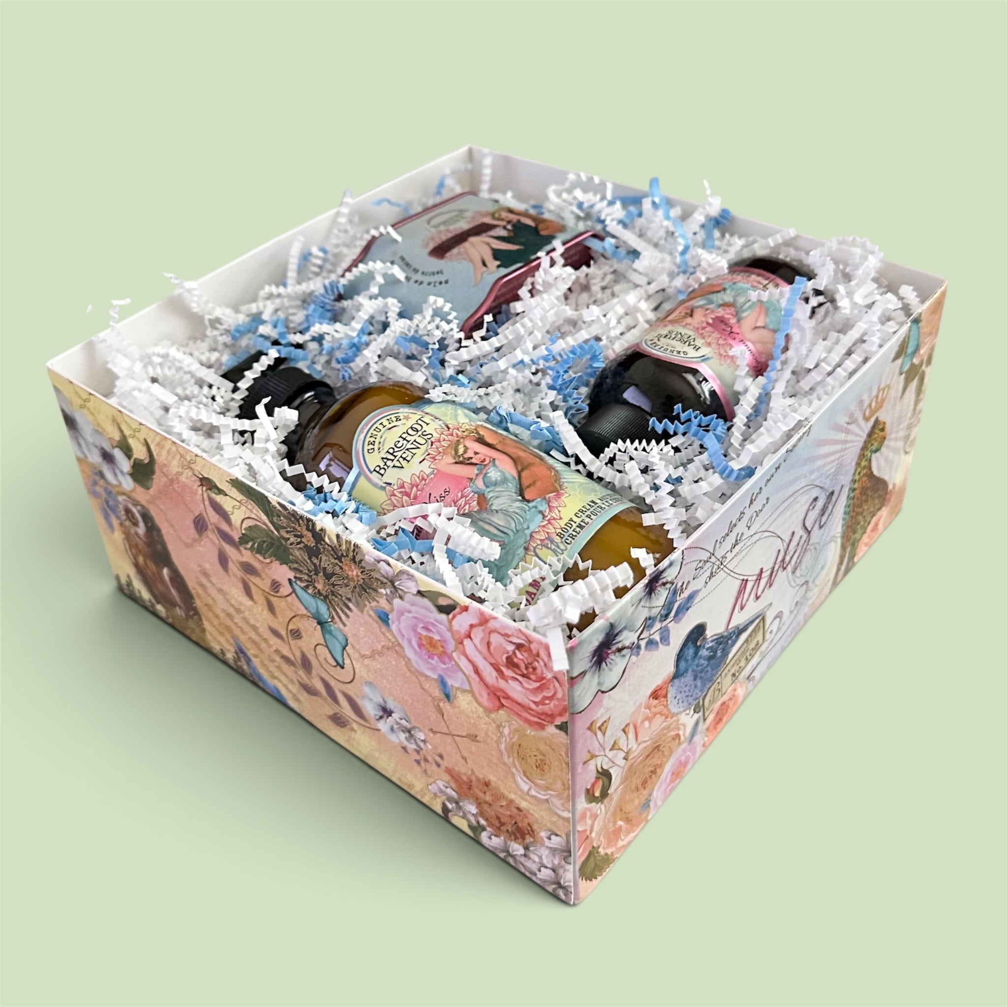 Bath gift set in decorated box with assortment of Barefoot Venus bottles and tin