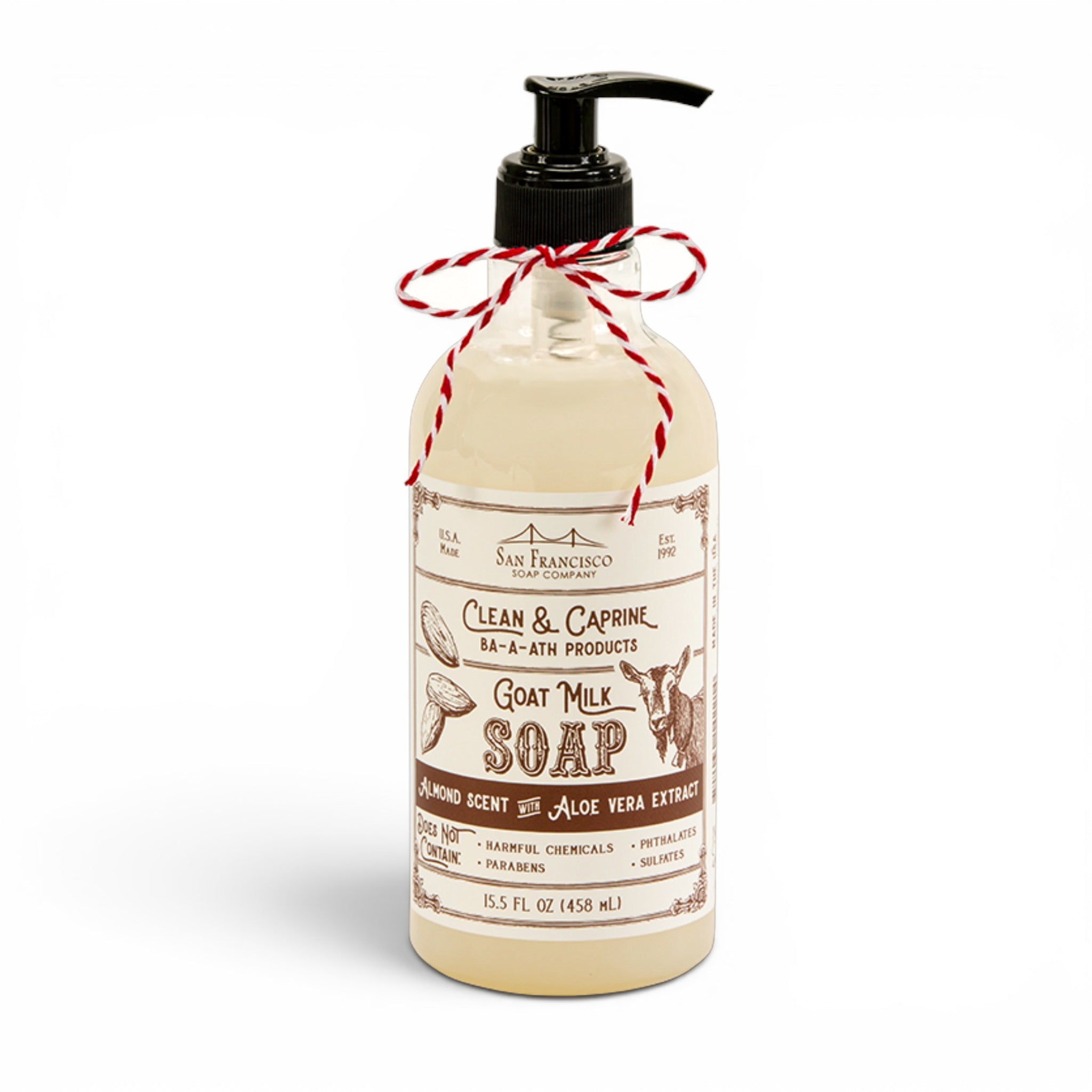 Bottle of goat milk soap with a label on a white background