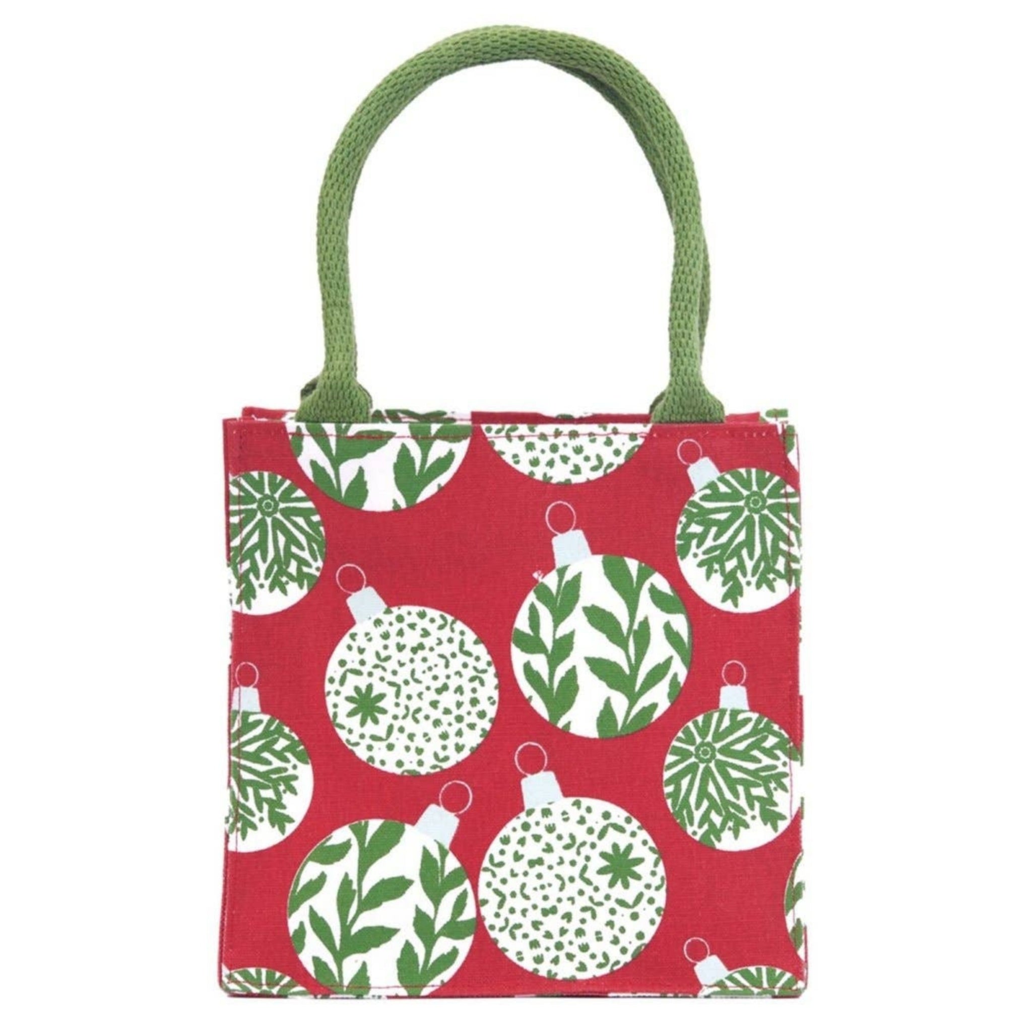 A small fabric tote bag with a red background and a pattern of white Christmas ornaments decorated with green leaves and dots. The bag has a green rope handle and is shown against a plain white background.