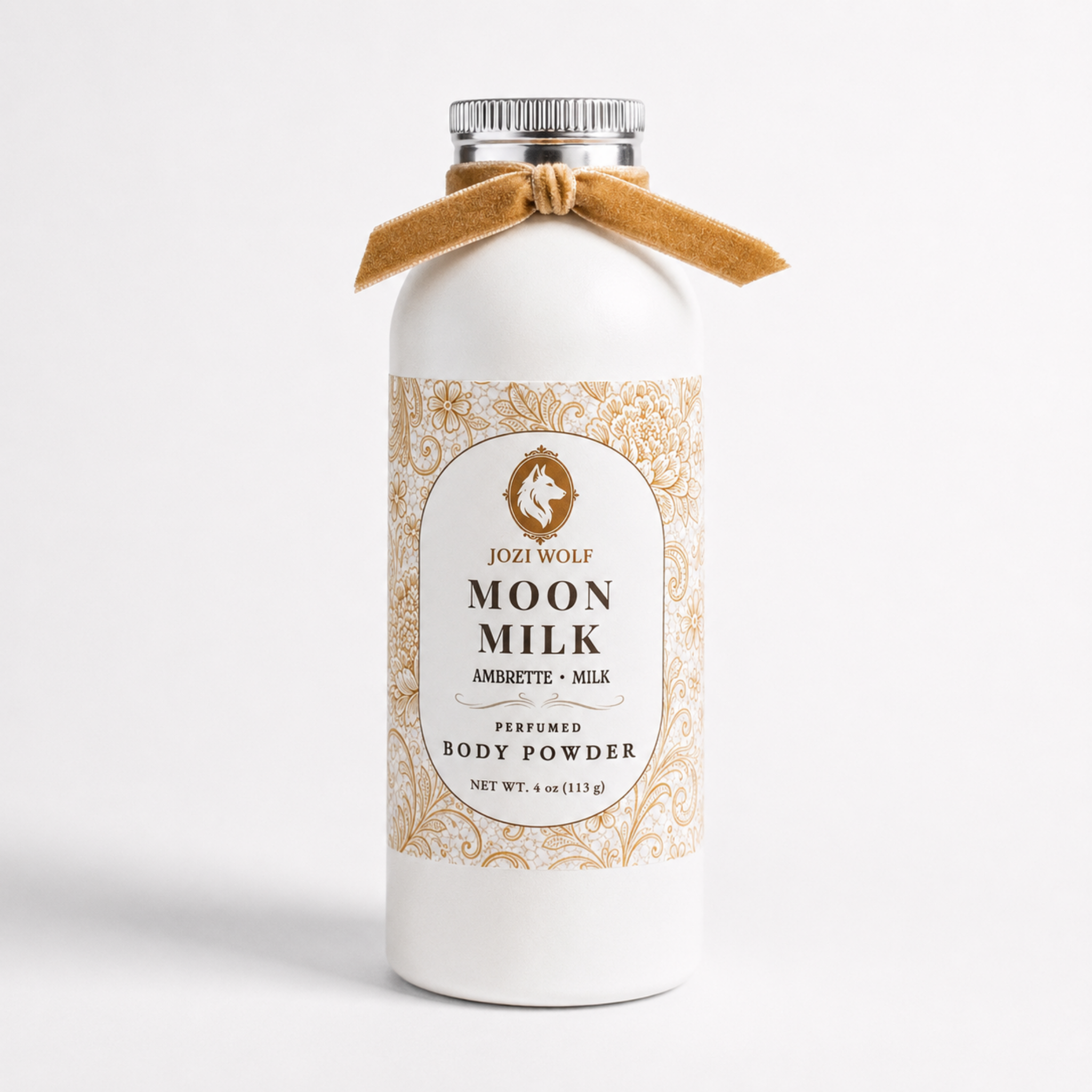 Perfumed body powder bottle with gold bow and decorative Moon Milk label