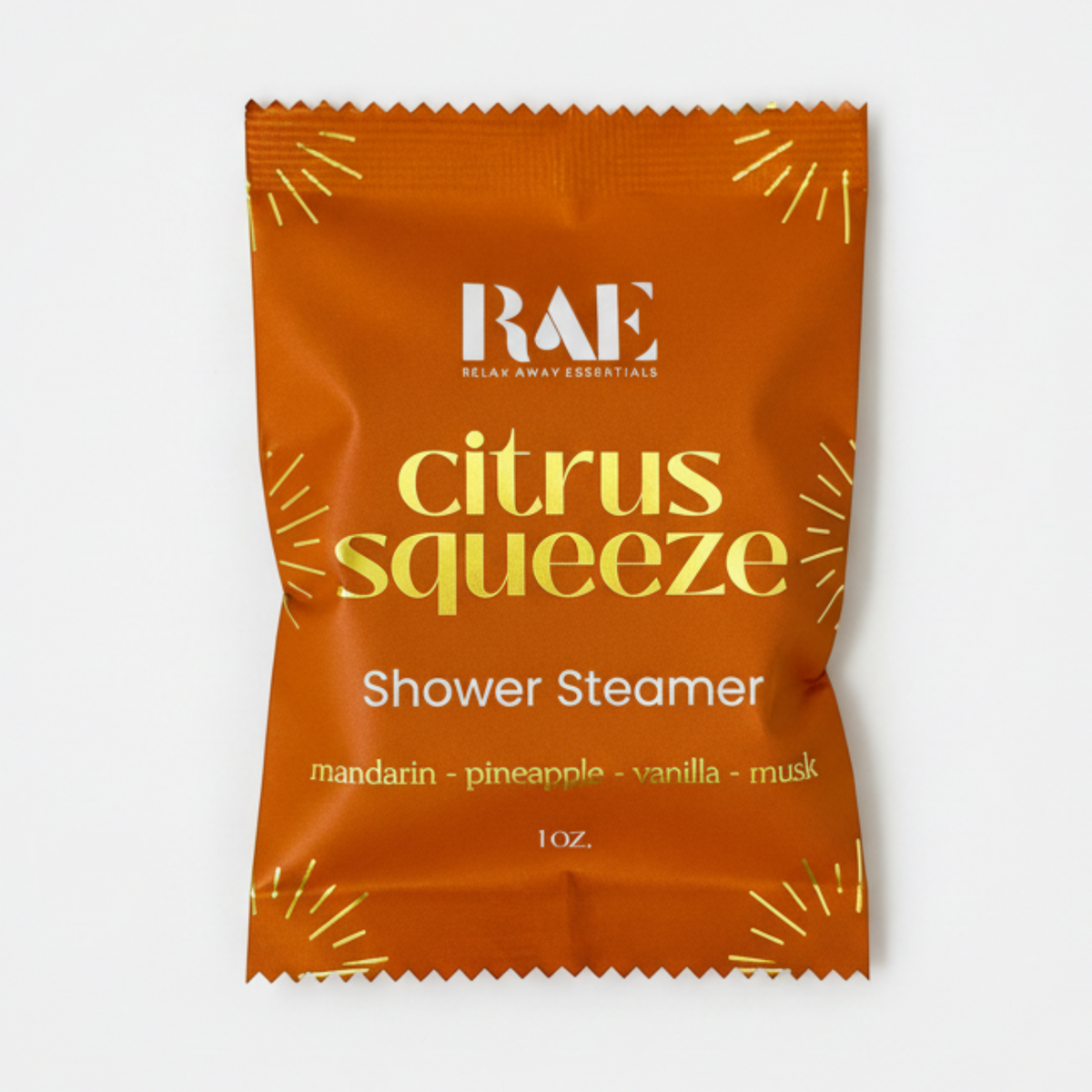 A single orange RAE Shower Steamer packet labeled 'citrus squeeze' with gold and white text, photographed on a plain light background.