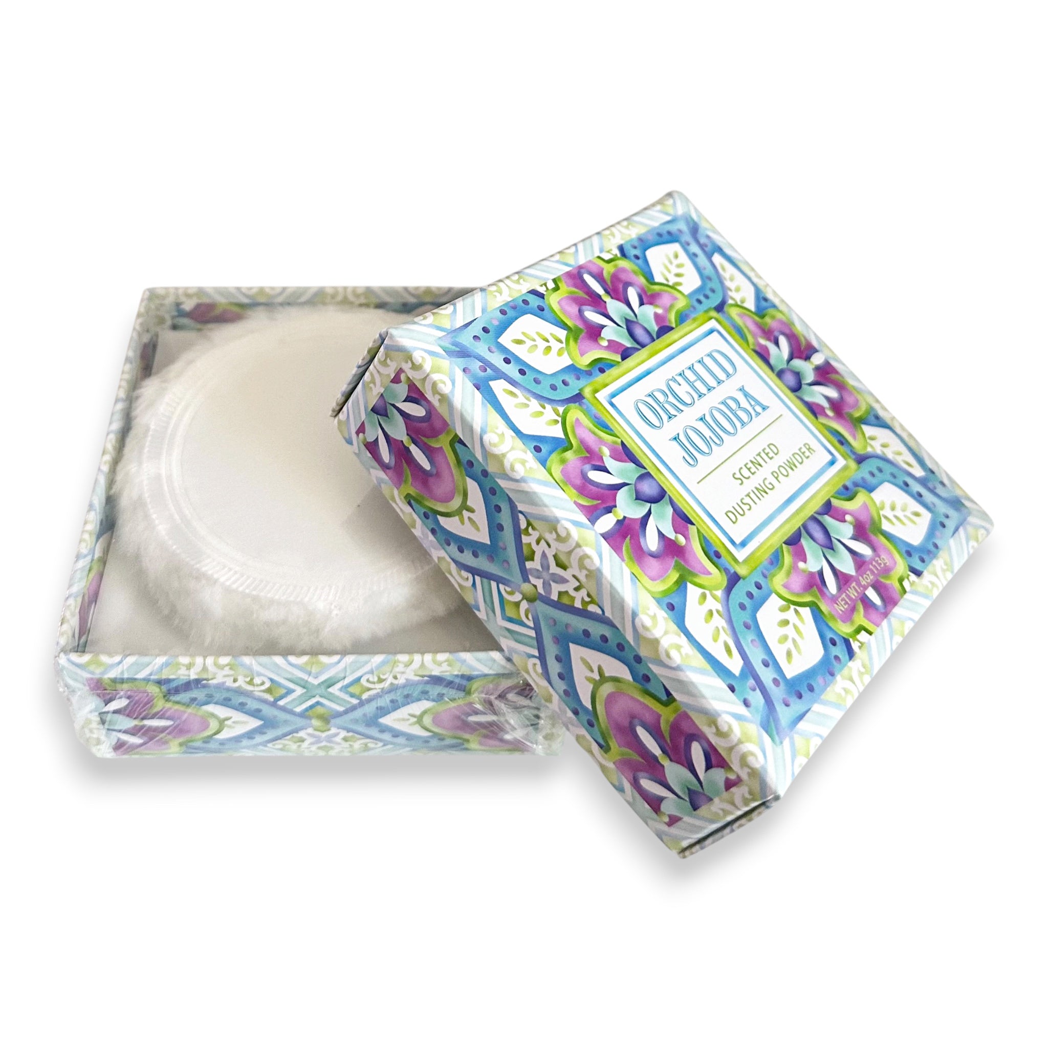 Soap bar in a decorative box with floral patterns on a white background