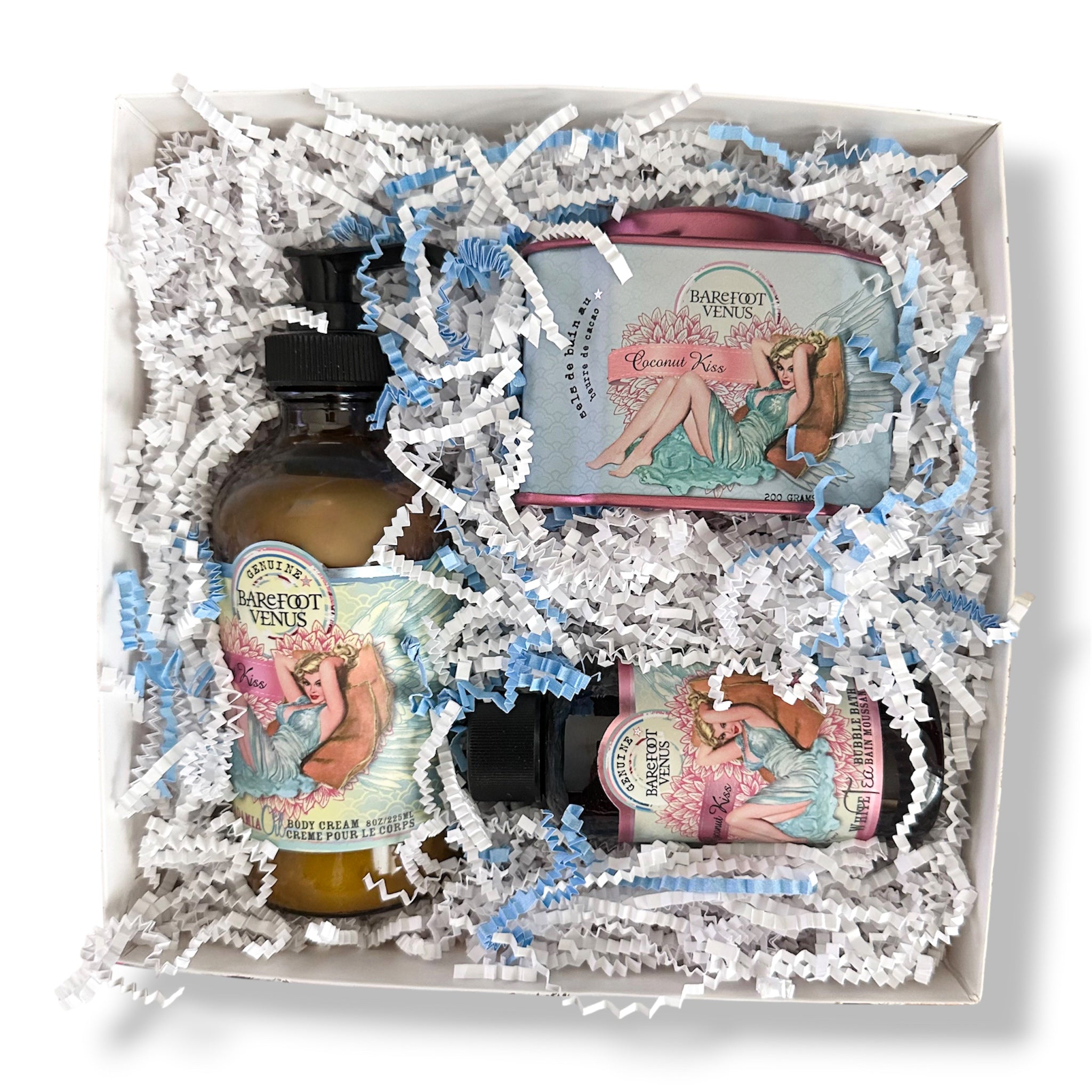 Bath gift set box with three Barefoot Venus bottles and body cream tin in filler