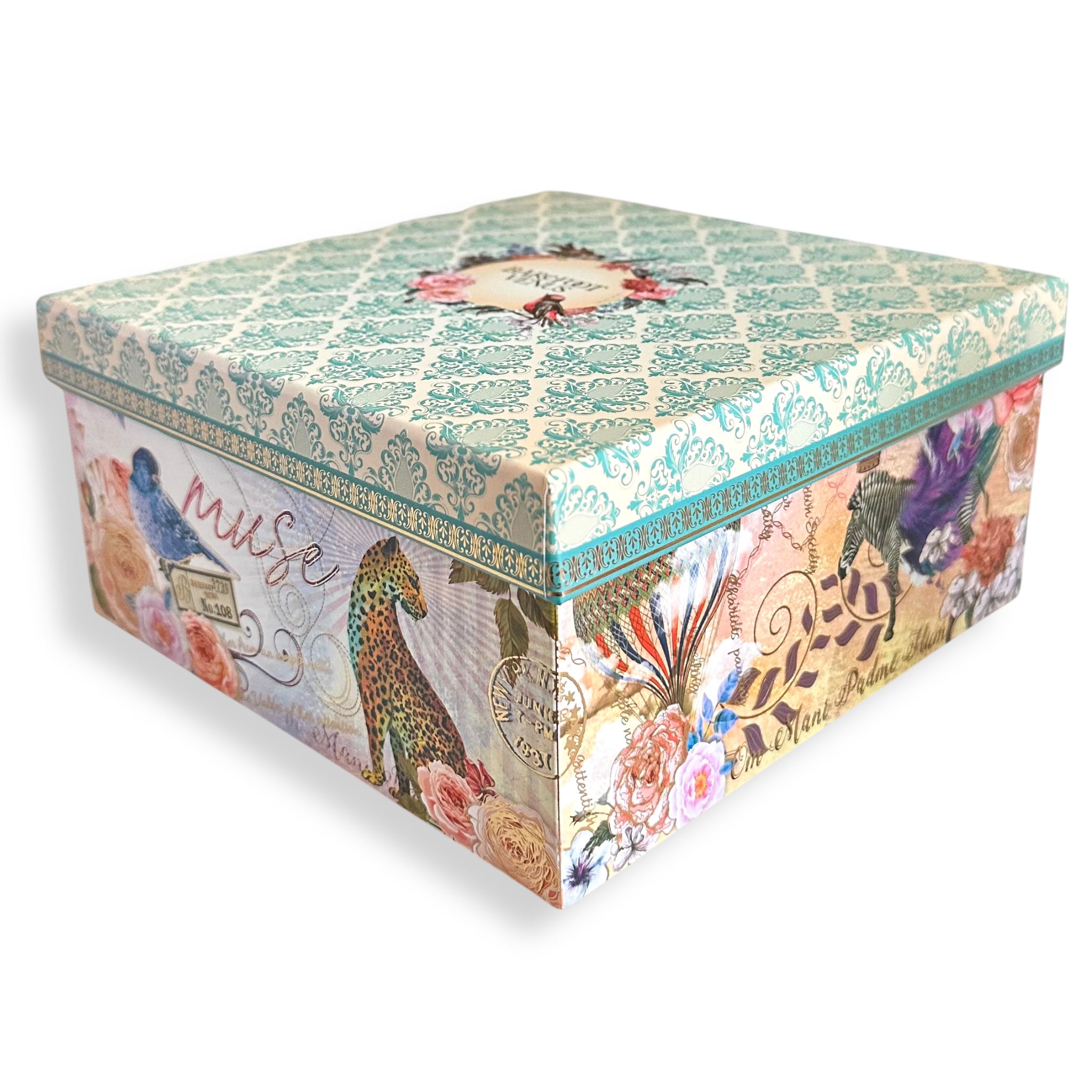 Decorative bath gift set box with teal lid and illustrated animal and floral design