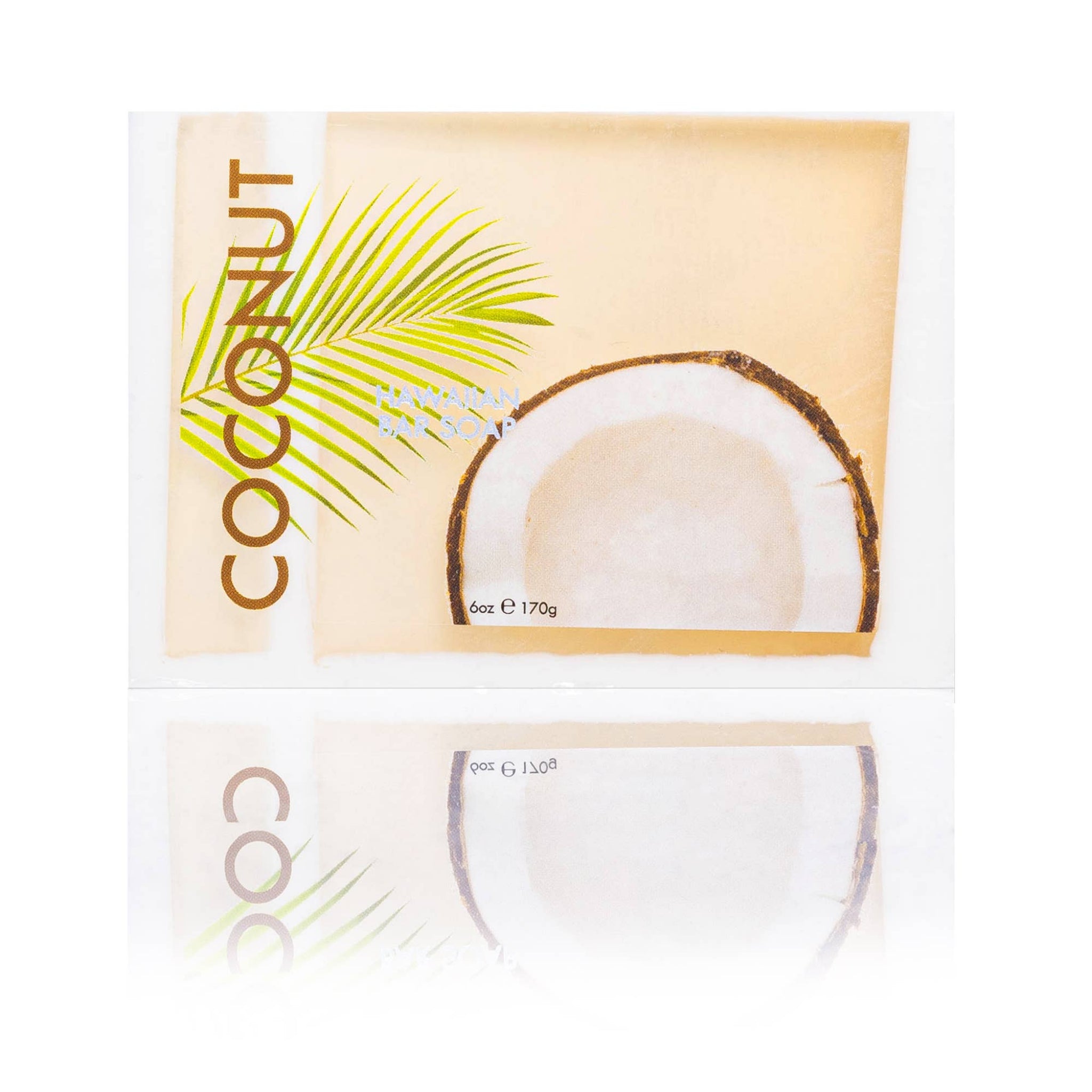 Coconut soap bar with packaging featuring a palm leaf design on a white background
