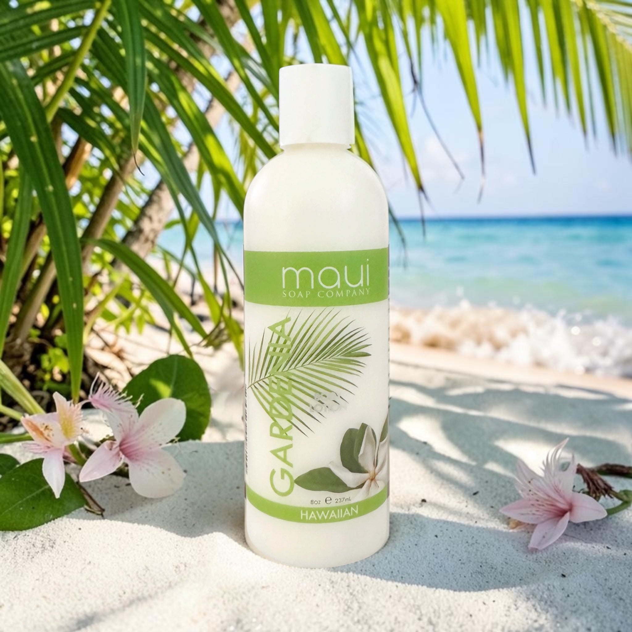 Gardenia body lotion bottle with white cap, white bottle, tropical plant label