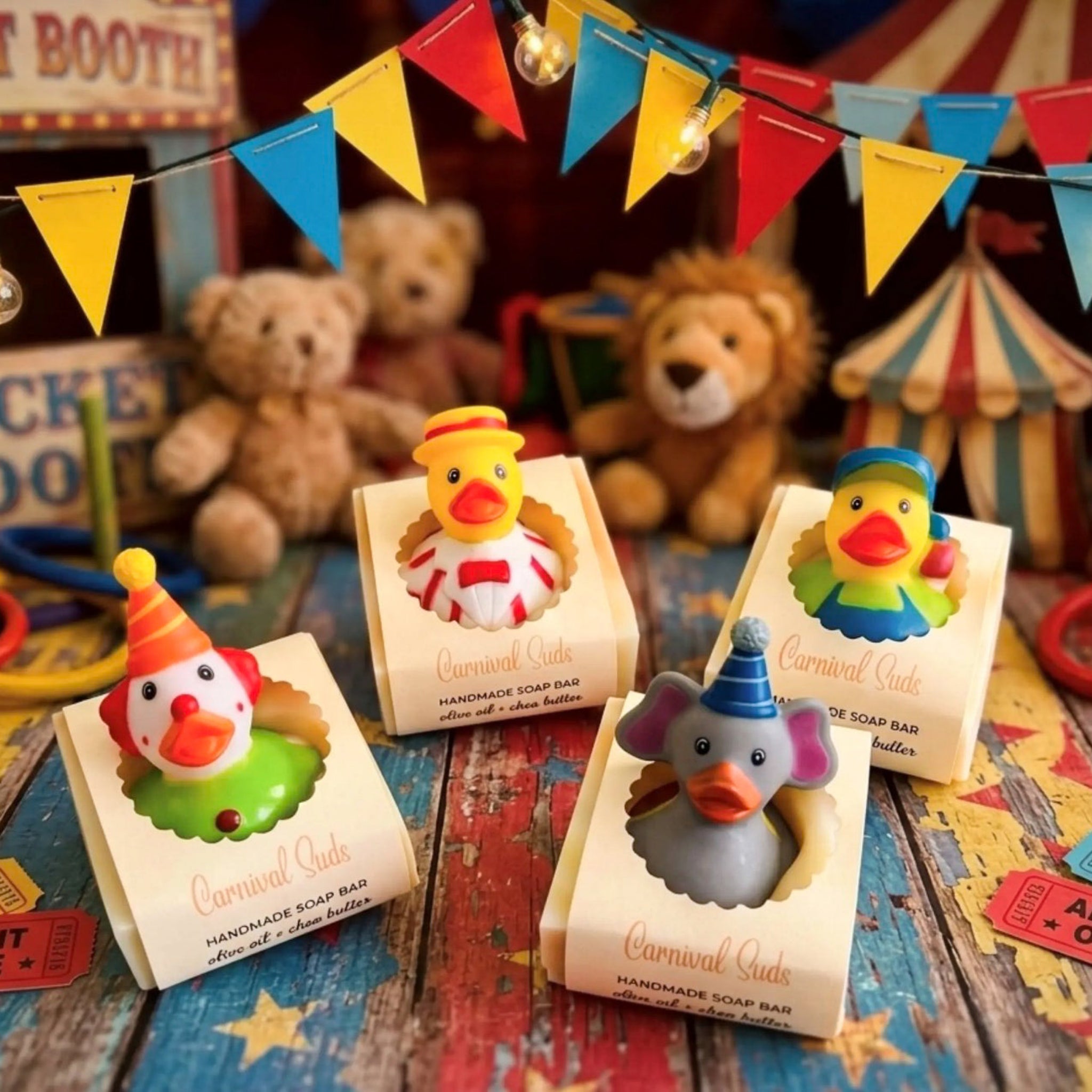 Set of four kids' handmade soap bars with circus character faces in assorted colors