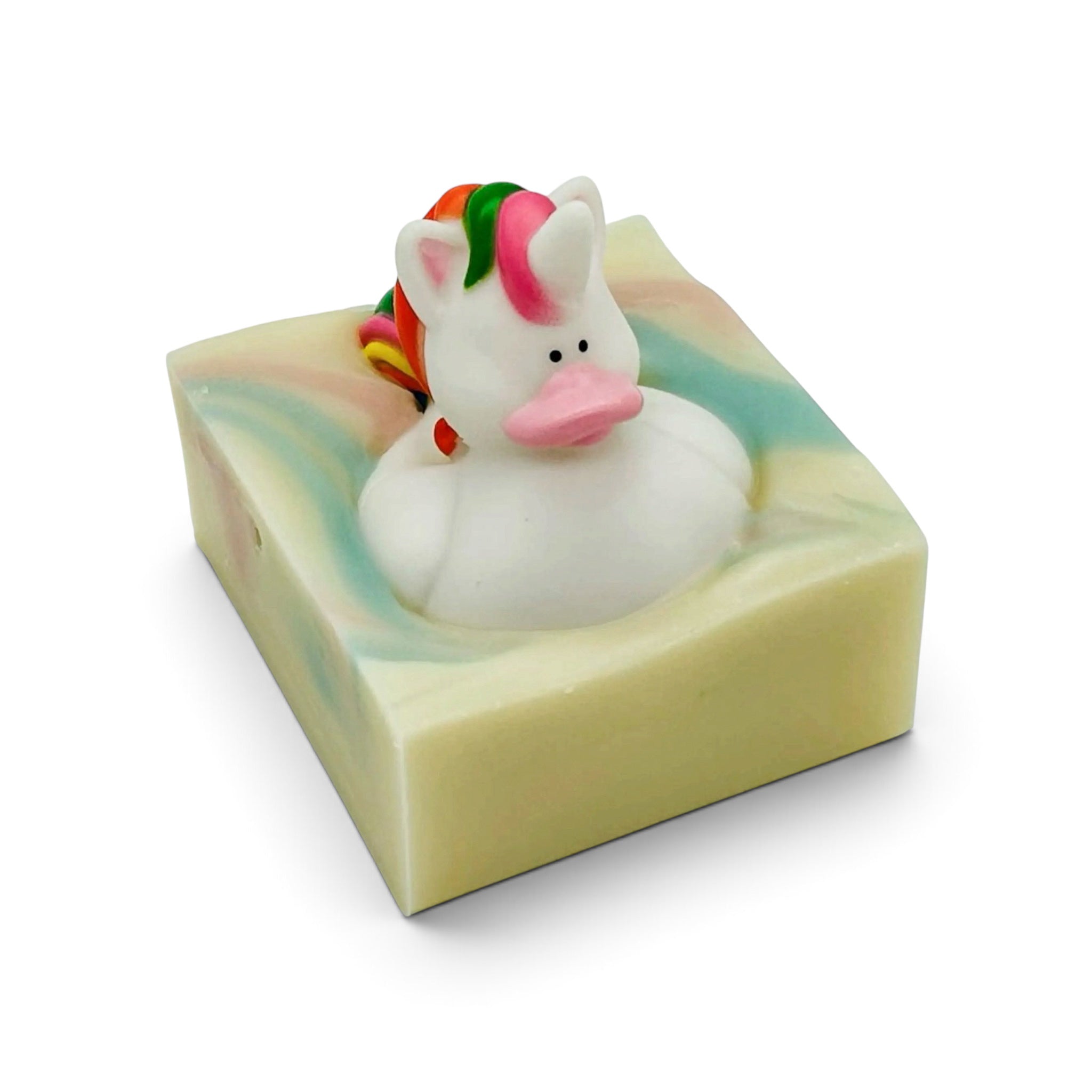 Single pastel yellow handmade soap bar with unicorn face topper and red-green mane.