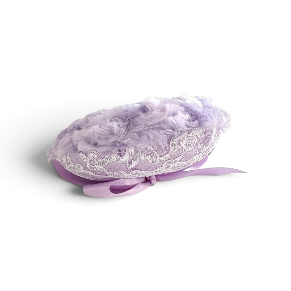 A lavender purple bonnet featuring fluffy faux fur trim, white floral lace, and a matching purple ribbon bow, shown on a clean white background.