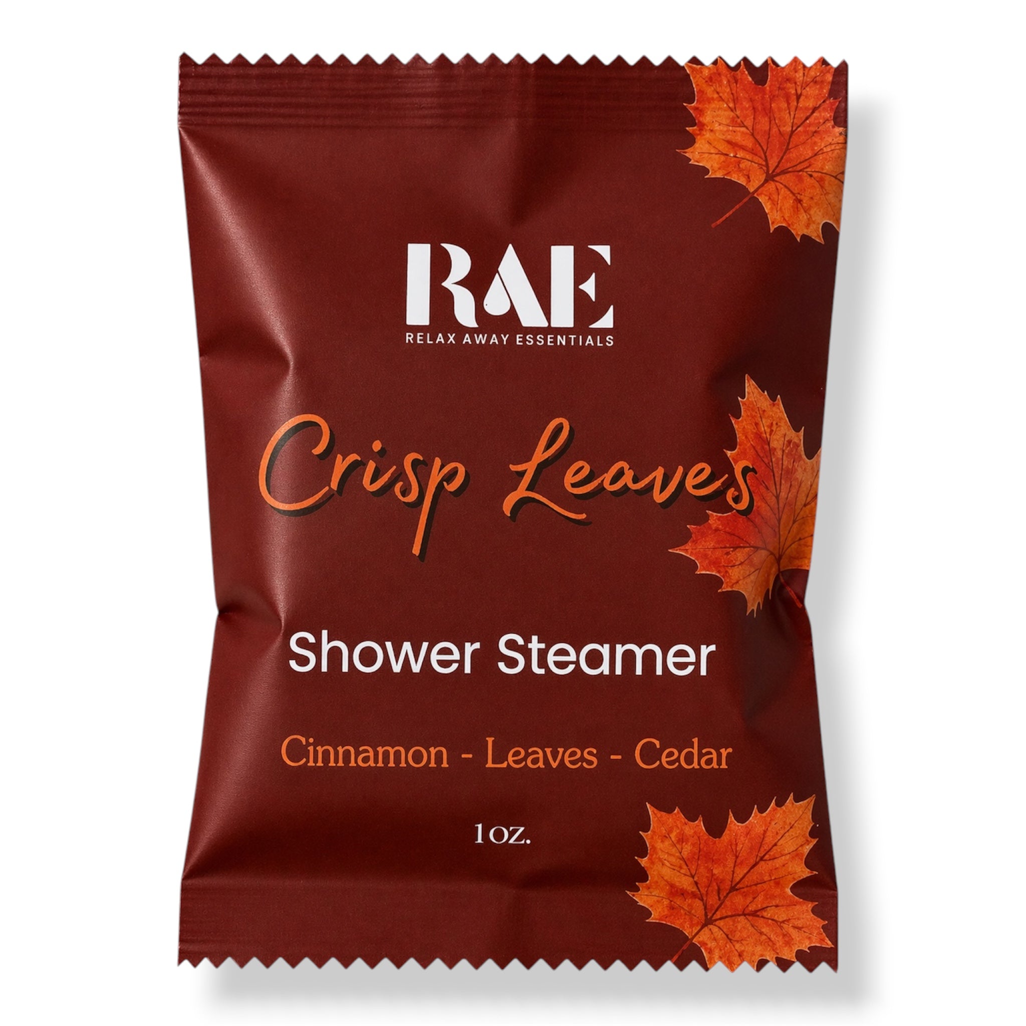 A single 1 oz pouch of RAE Relax Away Essentials Shower Steamer, flavor Crisp Leaves (Cinnamon - Leaves - Cedar). The packaging is dark reddish-brown with orange and white text and illustrations of autumn leaves, set against a plain white background.