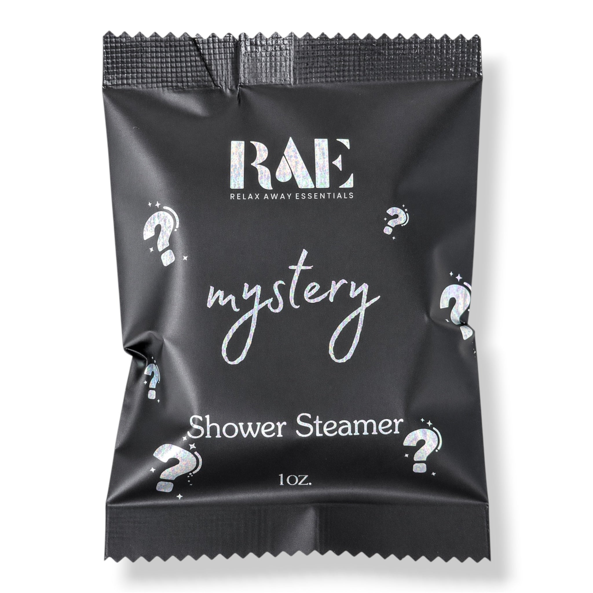A single black foil packet for a shower steamer, branded RAE Relax Away Essentials, with white text reading 'mystery shower steamer' and question mark graphics on a white background.