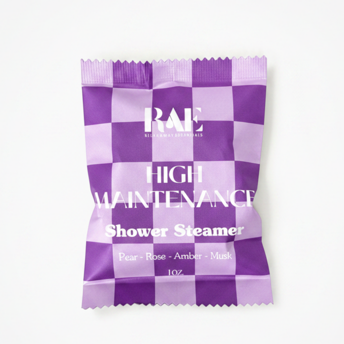 Purple and white checkered shower steamer packaging with 'RAE' branding.
