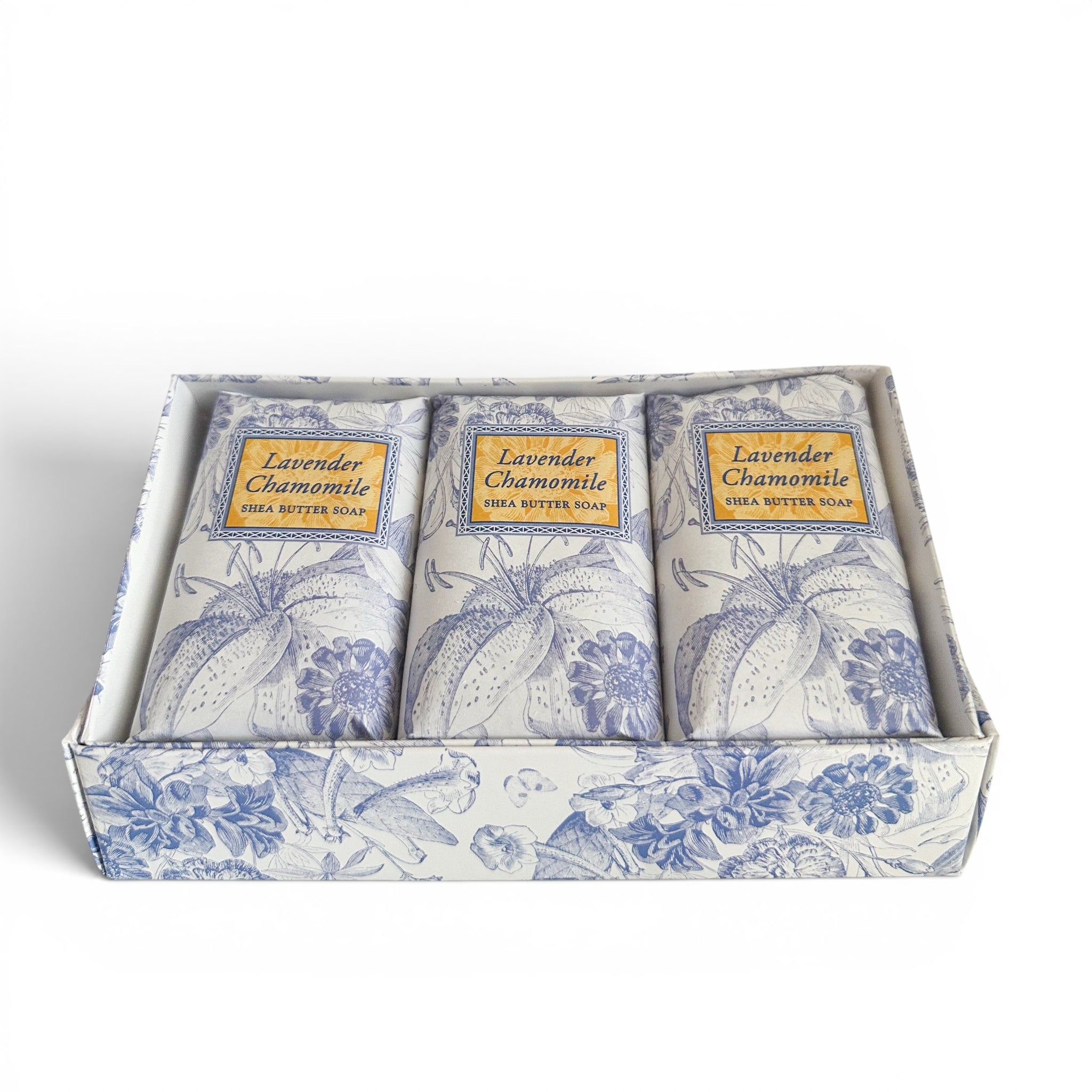 Three bars of lavender chamomile soap in a decorative box with floral design.